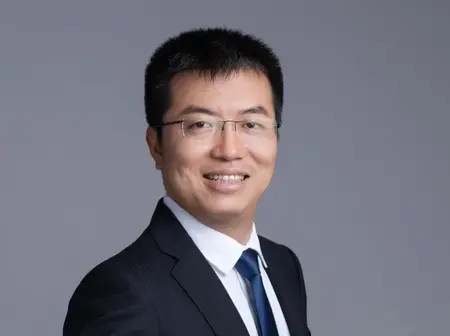Futu’s Li Hua Rides Global Expansion to $9.6 Billion Fortune